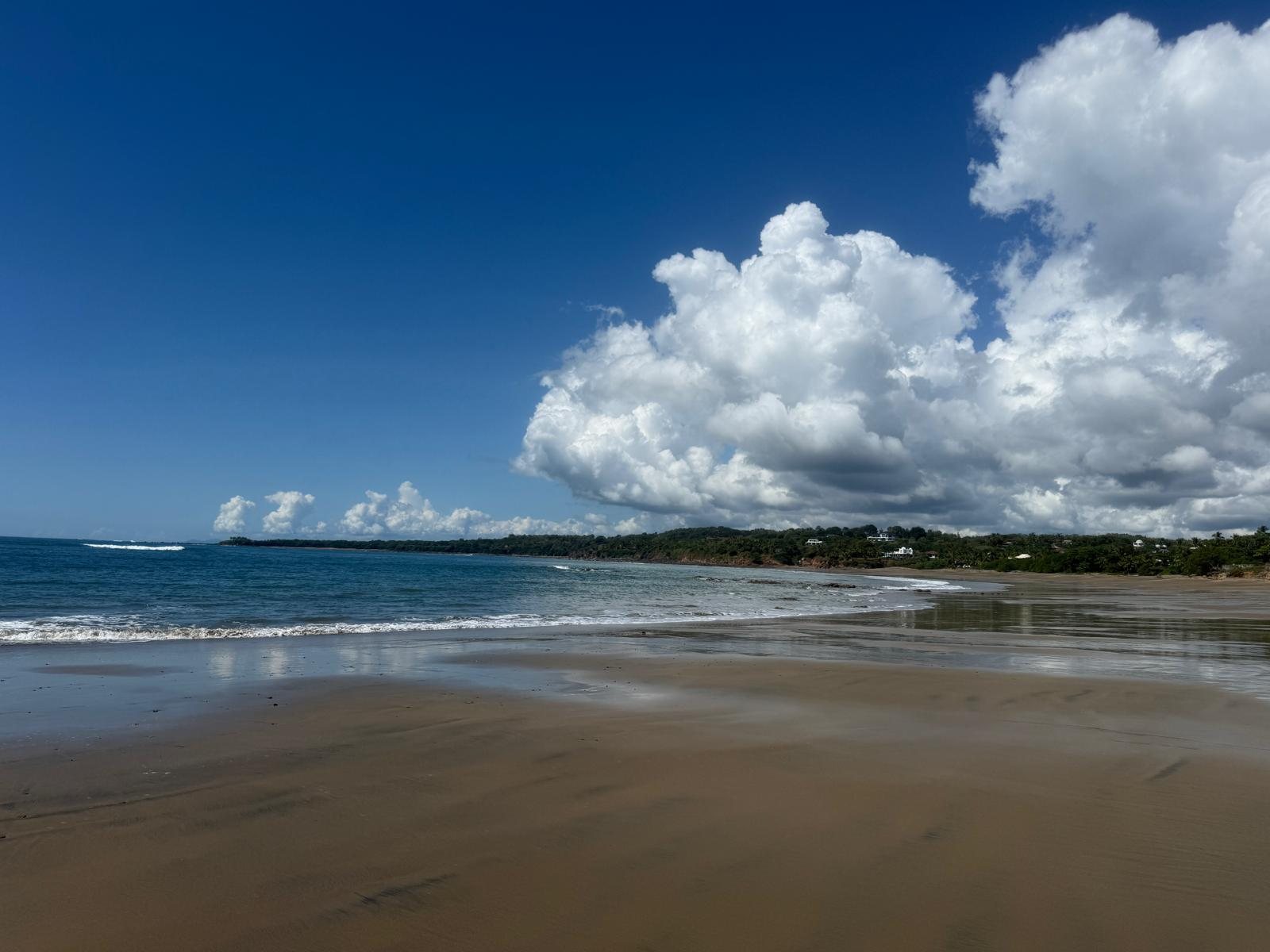 Summer clouds over the beach
